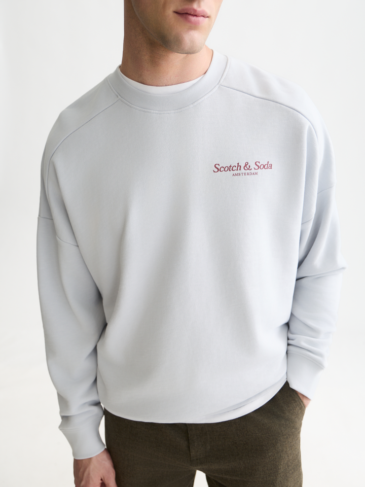 Front and back artwork relaxed-fit sweatshirt