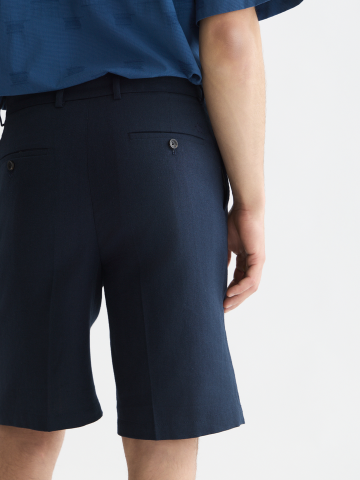 Pleated linen-blend herringbone wide fit chino shorts