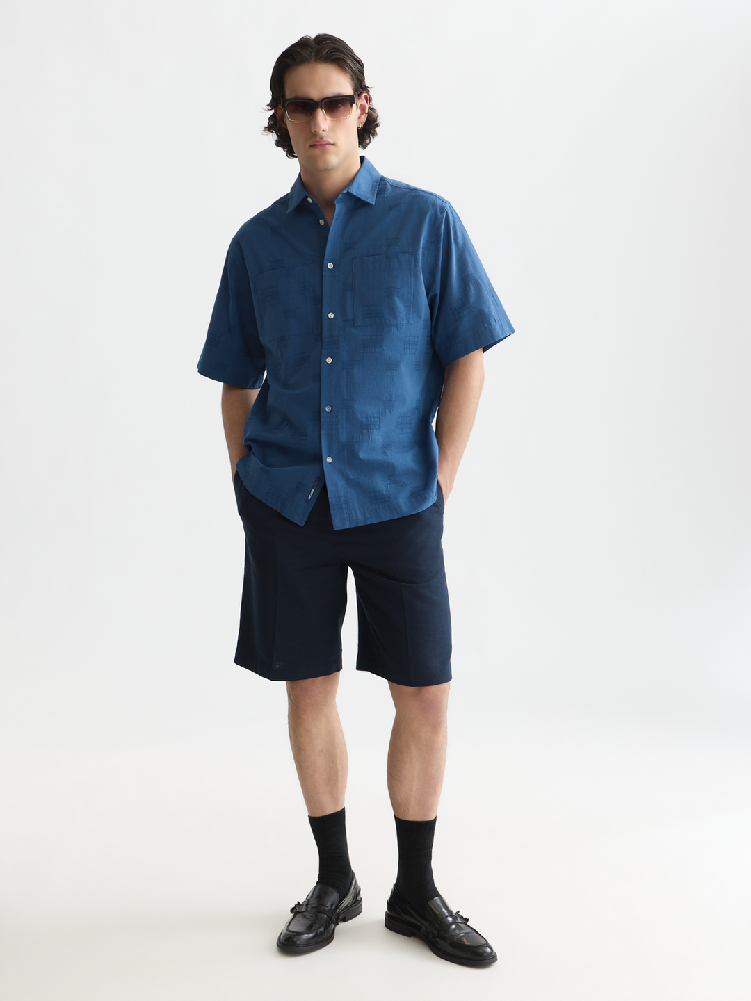 Pleated linen-blend herringbone wide fit chino shorts