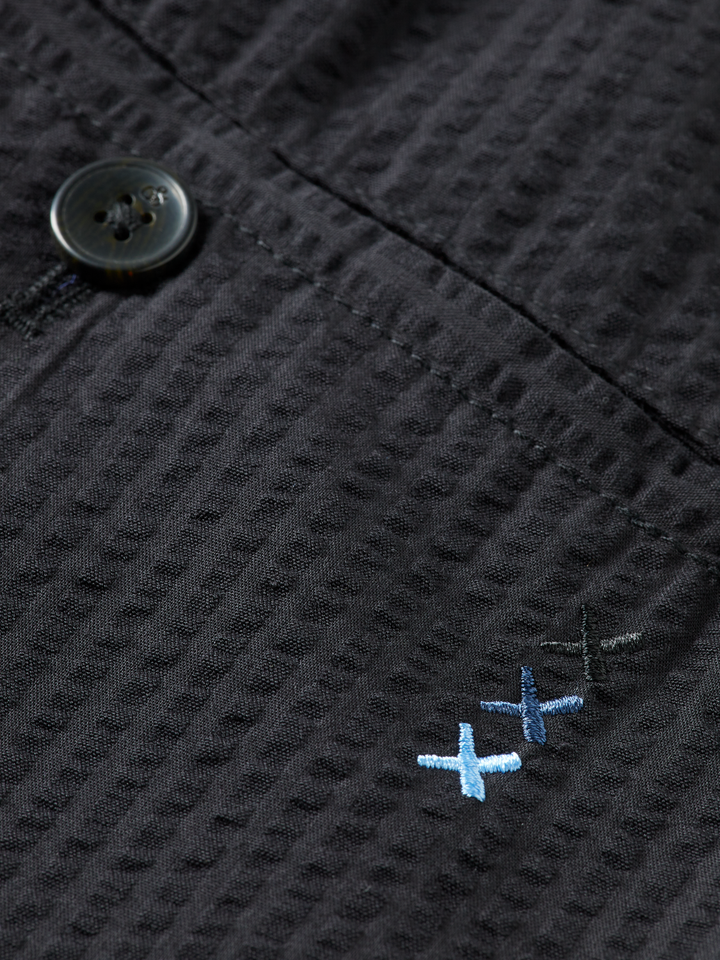 Pleated relaxed straight cotton-blend seersucker jogger