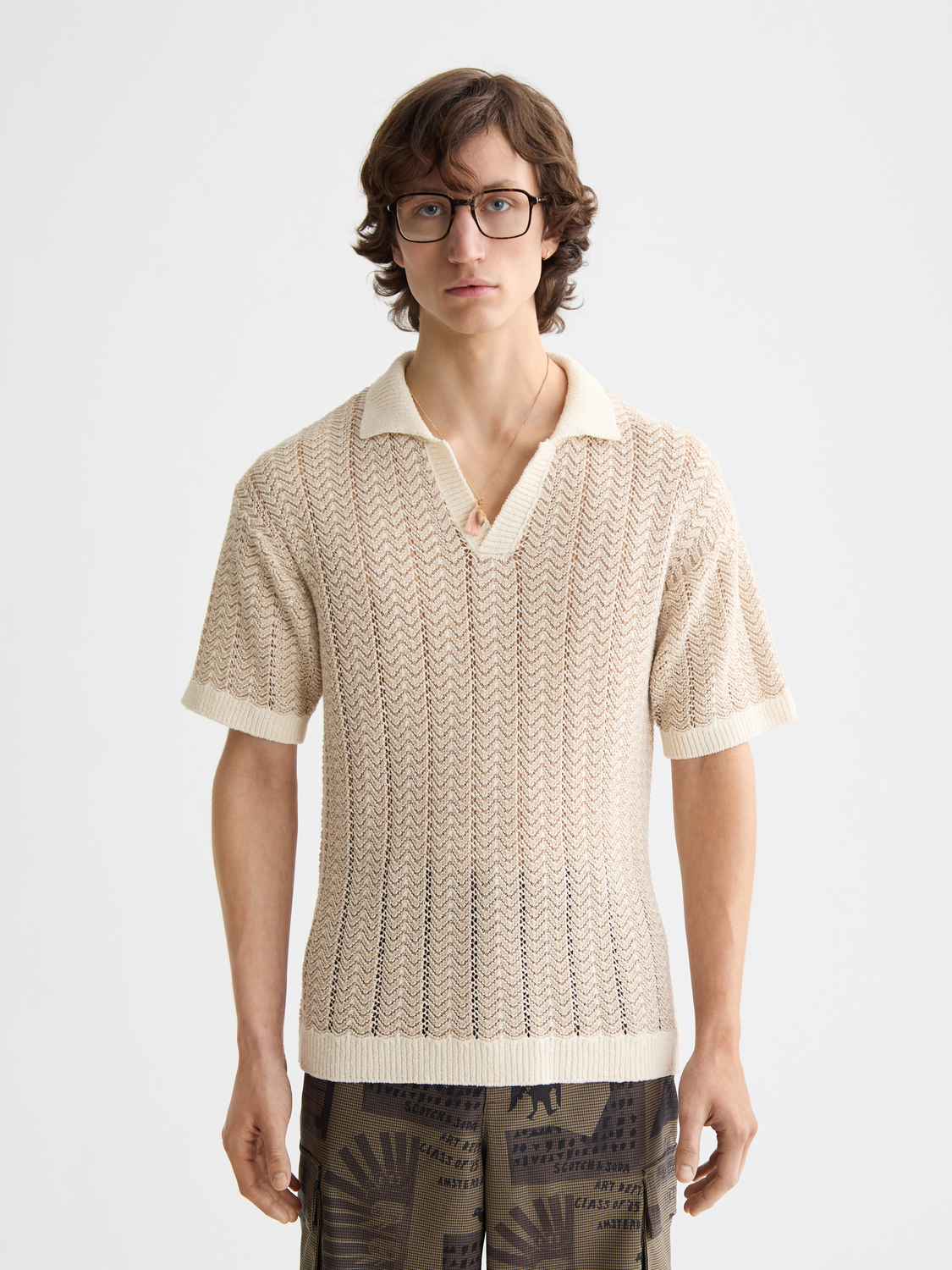 Open structured knitted v-neck polo