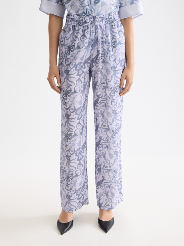 Gia-Mid rise wide leg elasticated trousers in block print