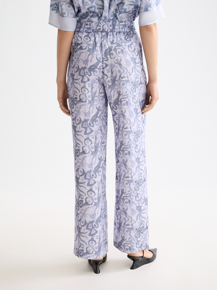 Gia-Mid rise wide leg elasticated trousers in block print