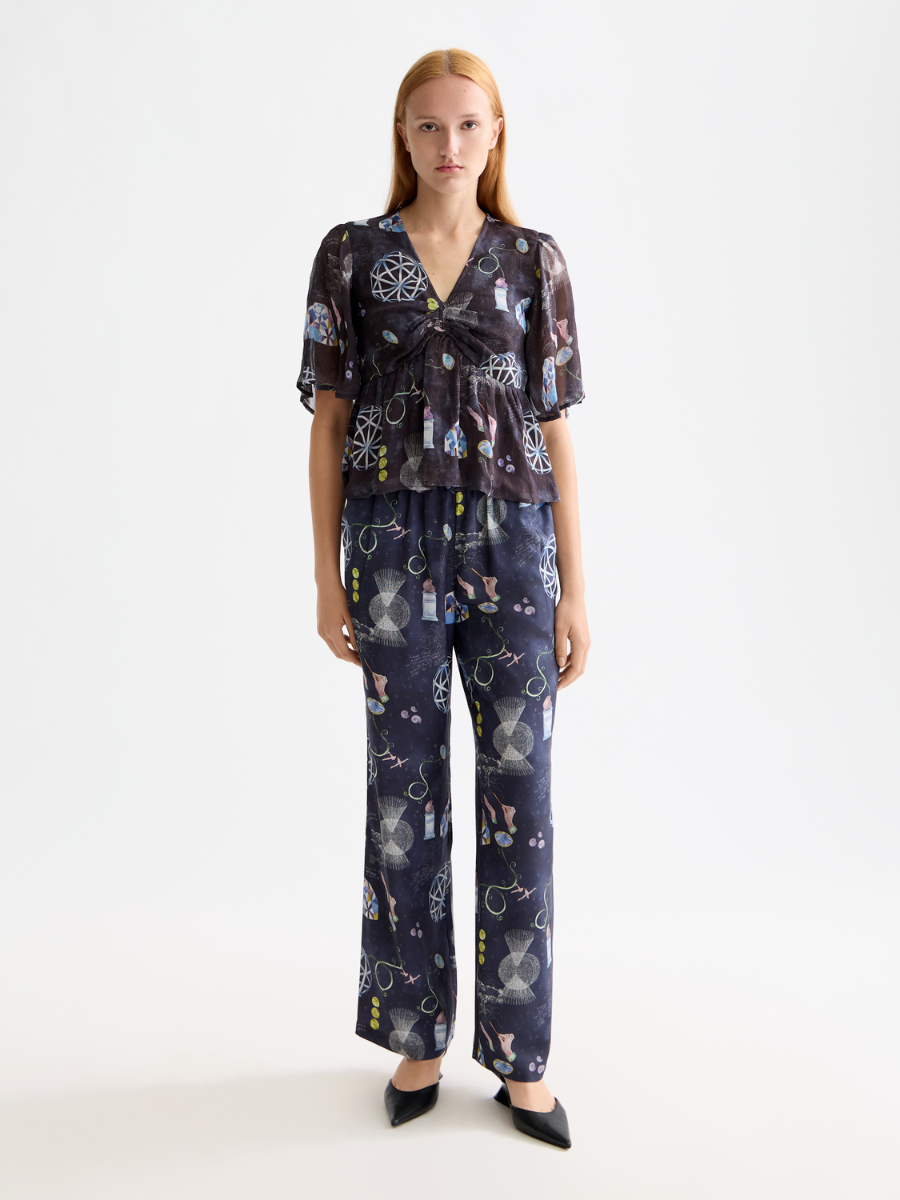 Gia Mid rise wide leg elasticated trousers in block print