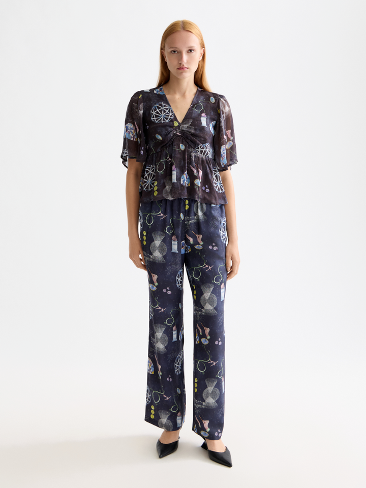 Gia Mid rise wide leg elasticated trousers in block print