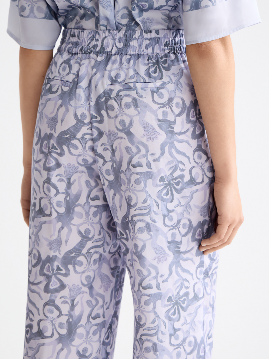 Gia-Mid rise wide leg elasticated trousers in block print